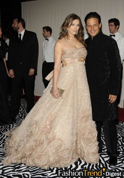 Liz Hurley in Elie Saab, with Arun Nayar 