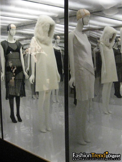 Black dress by Prada (spring/summer 1994), white ensemble (spring/summer 2000) and dress (spring/summer 1997) by Helmut Lang<br>
 