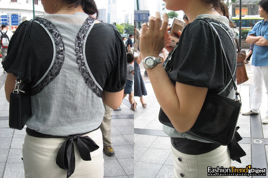 grey vest lady<br>
<br>
FTD: Could you describe your style today?<br>
<br>
answer:I come out today in a hurry, so I haven't think much of my style today. I am attending an activity today. I think my style today is semi formal and semi casual. I don't wear shirt today because that looks too formal.<br>
<br>
FTD: What's your style in other days?<br>
<br>
answer:I like elegant and decent. <br>
<br>
Anna: What's do you think of Shanghai street style this year?<br>
<br>
answer:I think people in Shanghai like more Korean clothing more. Because that looks smart. <br>
 