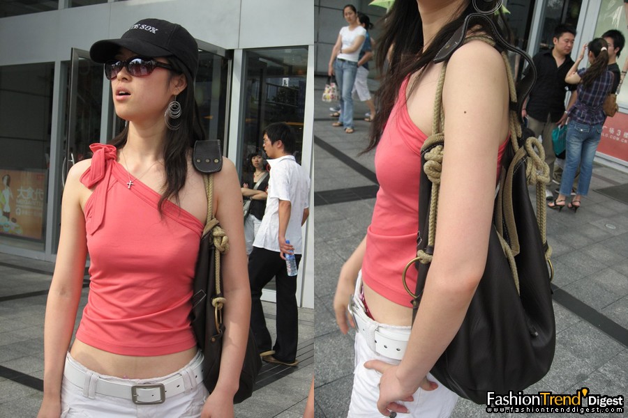 red Tee Shanghai girls<br>
<br>
answer: I like my one shoulder sport tee and my hat. That's "White Sox", a baseball team, right?<br>
<br>
FTD: what do you think of Shanghai street style this year?<br>
<br>
answer: I think mini skirt and high heel are very hot.<br>
 