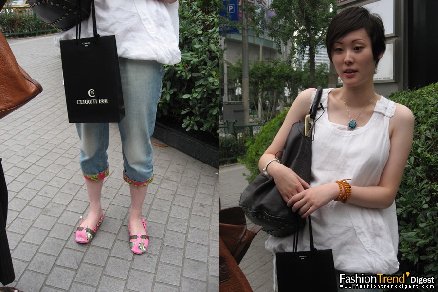 white tank, blue jeans<br>
<br>
Hello, my name is Guo zi jing, 28 years old. I am a sales manager.<br>
<br>
FTD: highlight today?<br>
<br>
anwer:I am casual today. I think my shoes are unique. It is from diesel. And my necklace is brought by my trip to tibet.<br>
<br>
FTD: favorite brands?<br>
<br>
answer:Chinese designer brand Zuc Zug, my top is this brand. Bag I like Kenzo/ Gucci and LV. <br>
<br>
FTD: Shanghai street trend?<br>
<br>
answer:Bright and fresh color <br>
 